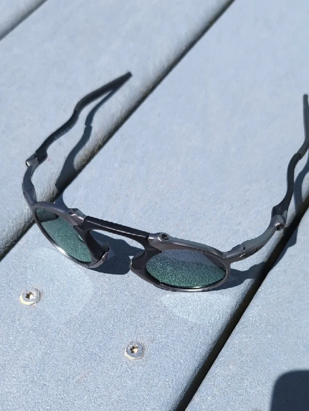 Oakley Madman Round Metal Black Silver Sunglasses with Polarized Mirrored Lenses